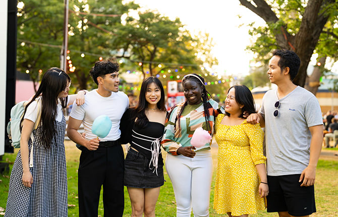 International students standing together at the Adelaide Fringe Festival