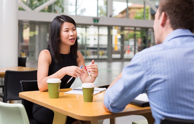 An international student having an English conversation with an Australian